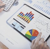 businesswoman-using-tablet-analysis-graph-company-finance-strategy-statistics-success-concept-planning-future-office-room-2