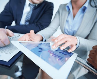 close-up-businesswoman-showing-graph-digital-tablet-1