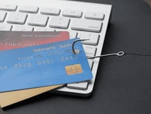 high-angle-keyboard-with-credit-cards-hook-phishing