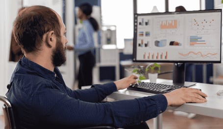 invalid-worker-with-disabilities-working-computer