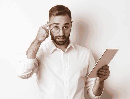 displeased-employer-scolding-staff-while-checking-report-digital-tablet-pointing-head-looking-disappointed-standing