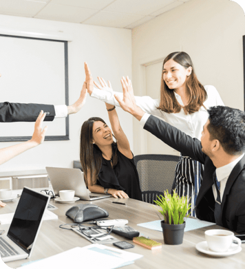 happy-subordinates-giving-high-five-after-successfully-undertaking-new-project-boardroom