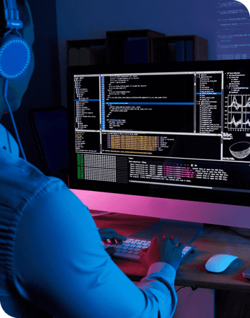 it-specialist-checking-code-computer-dark-office-night