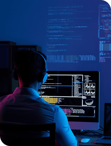 rear-view-programmer-working-all-night-long